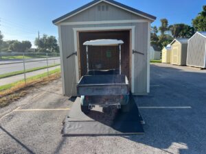 WeatherKing 10×12 Golf Cart Shed with Rampage Door Protect your golf cart with a durable WeatherKing shed featuring the Rampage® ramp door for easy drive-in access. Built strong, weather-resistant, and perfect for carts, ATVs, and lawn equipment. Available now at Gulf Breeze Gardens in Englewood, FL